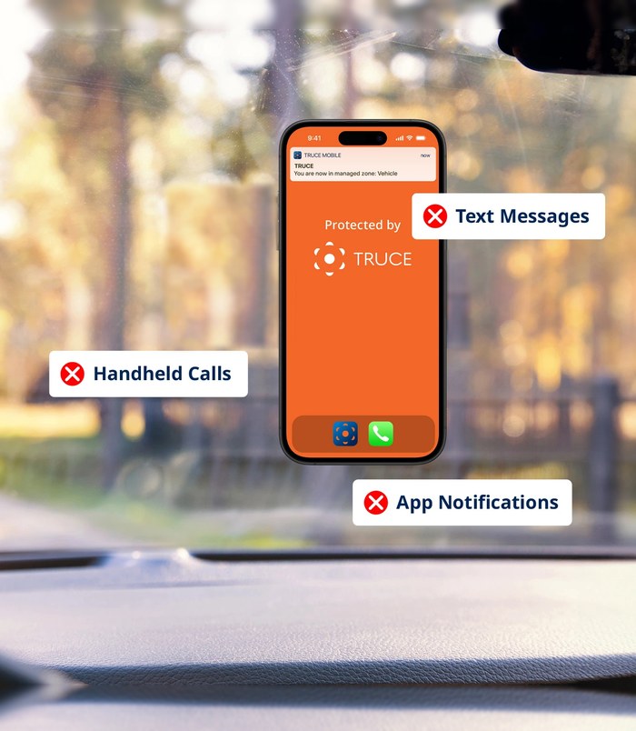 The driver's phone, protected by TRUCE while the truck moves: handheld calls, text messages and app notifications blocked automatically
