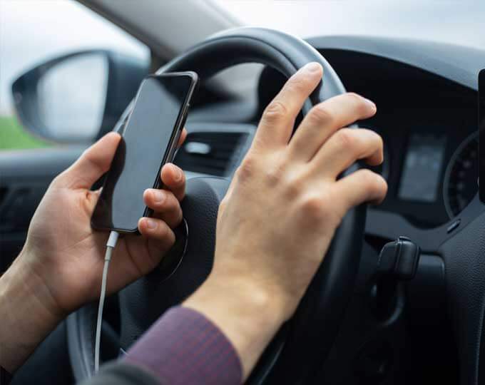 Work Demands Contribute to Distracted Driving Behaviors