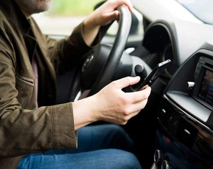 Work Demands Contribute to Distracted Driving Behaviors