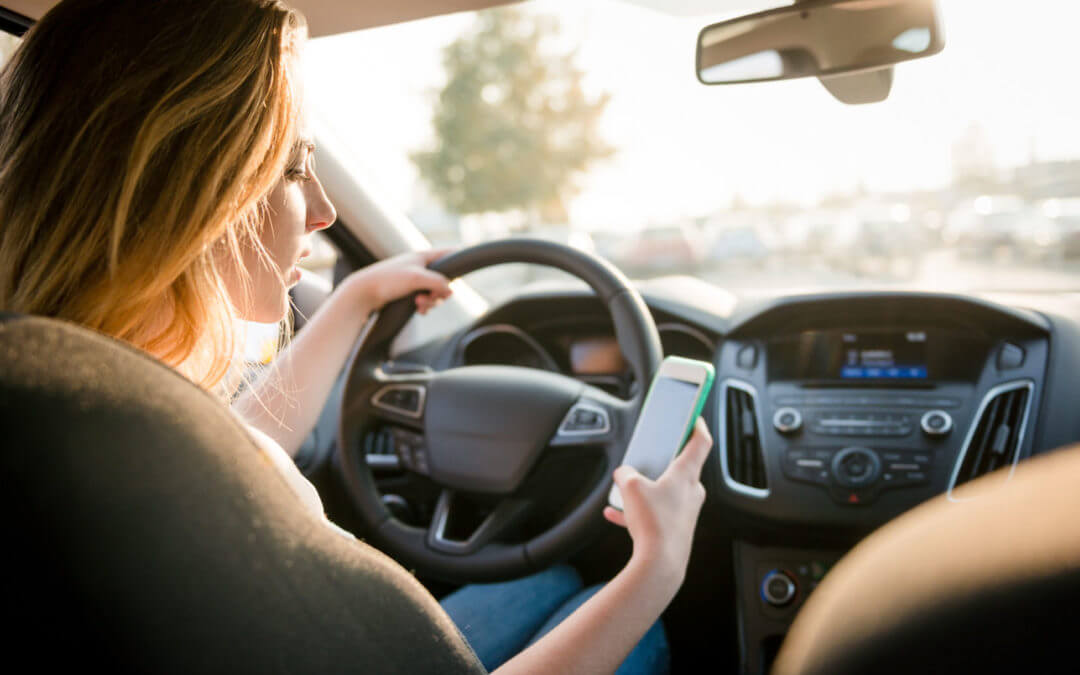 How Contextual Mobility Management Helps Reduce Distracted Driving Risks