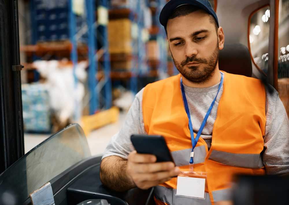 Mobile devices are a part of warehouse operations but can introduce risks on a forklift